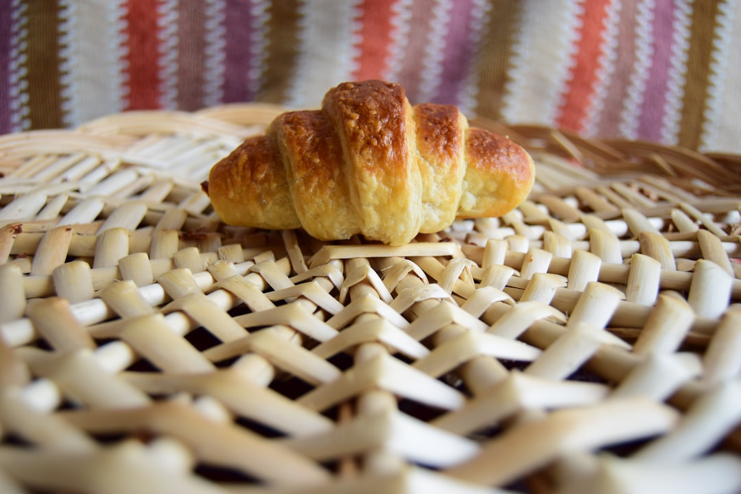 bread on white and red textile