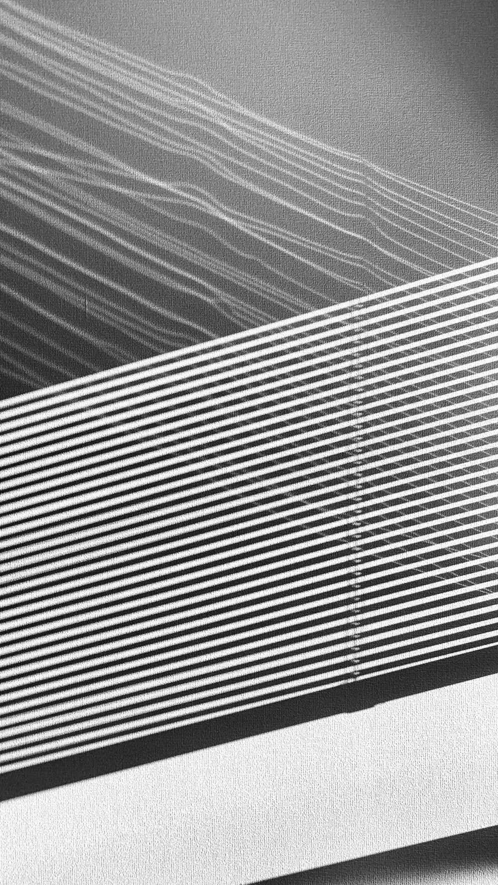 white and black striped textile