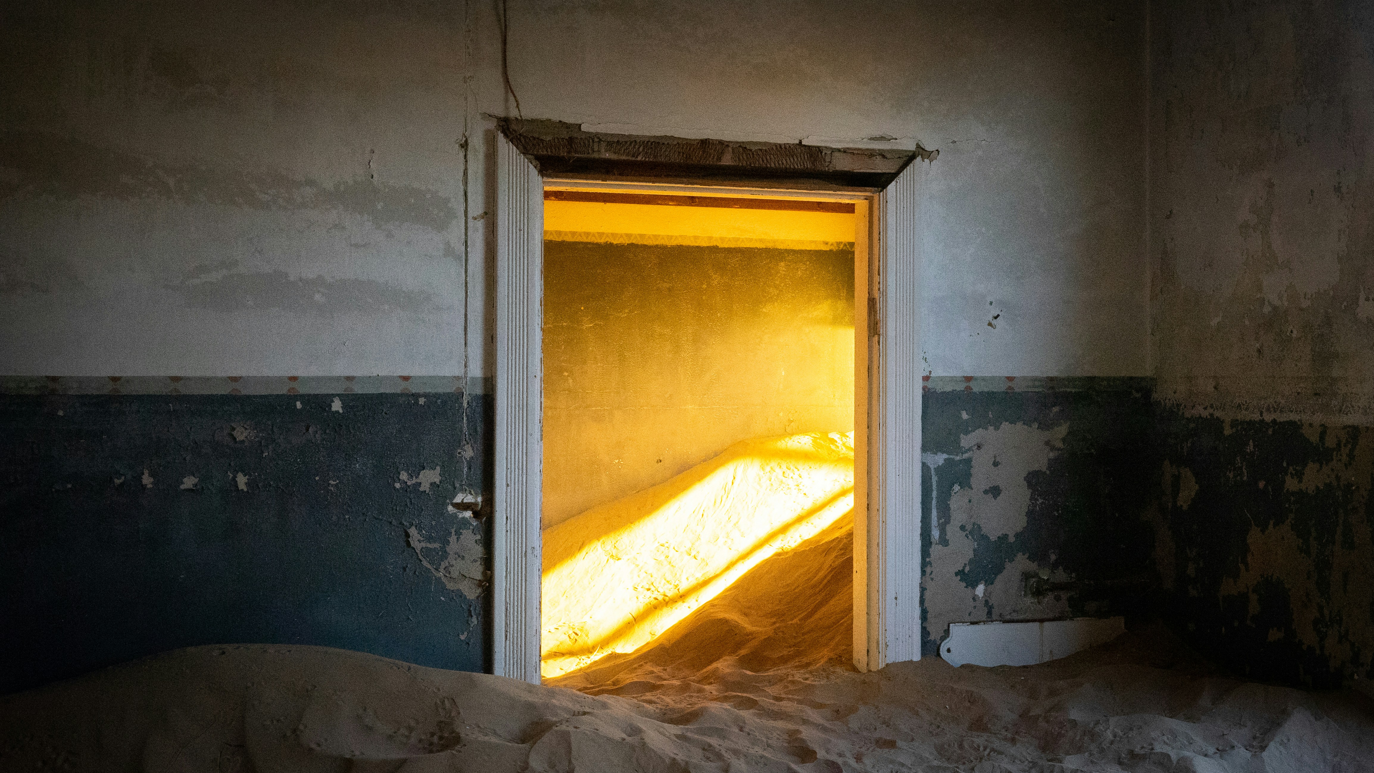 blue and yellow wooden door