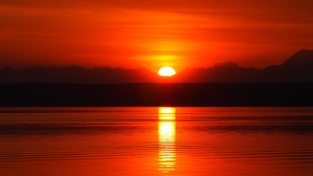 sunset over the sea and mountains