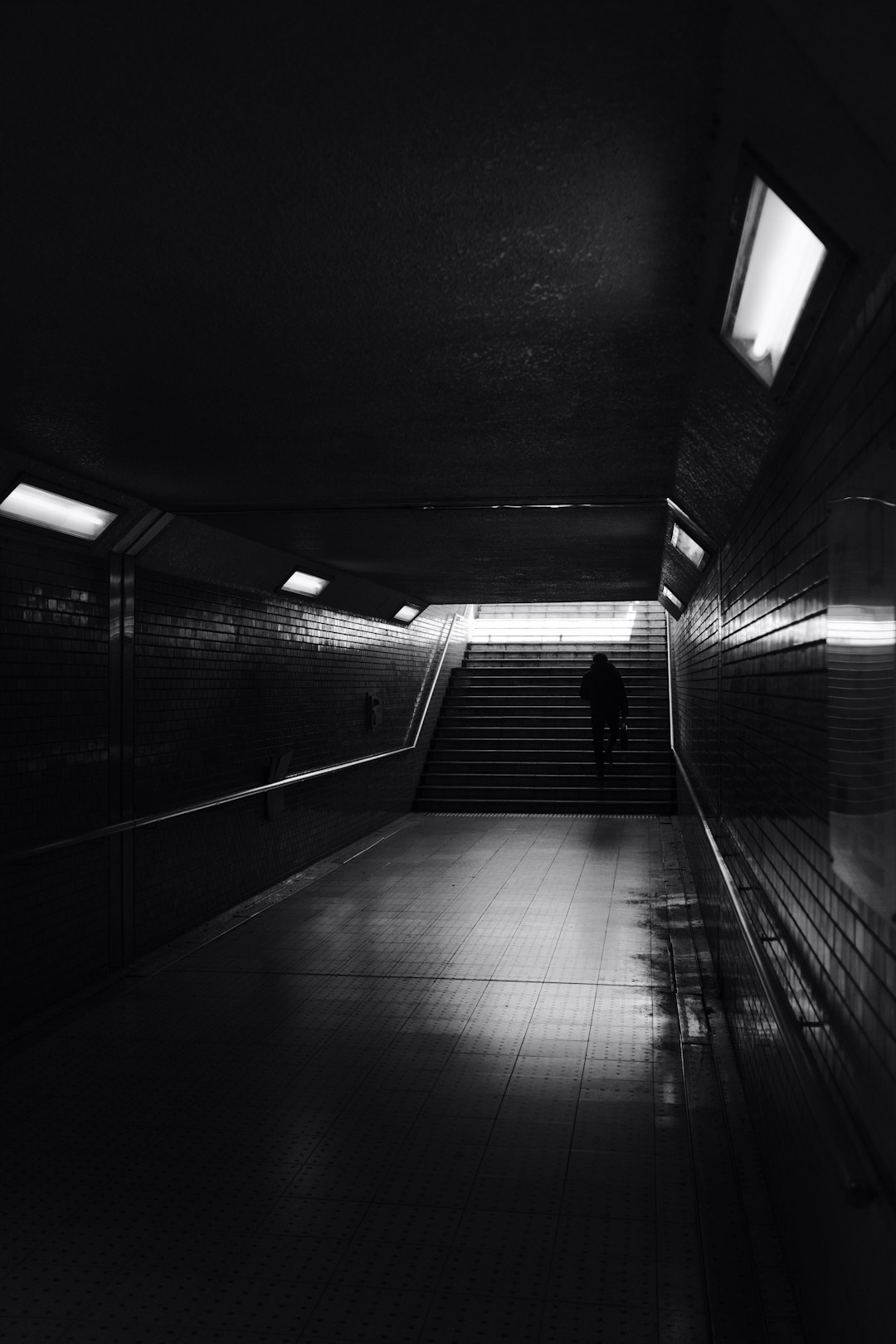 grayscale photo of empty hallway