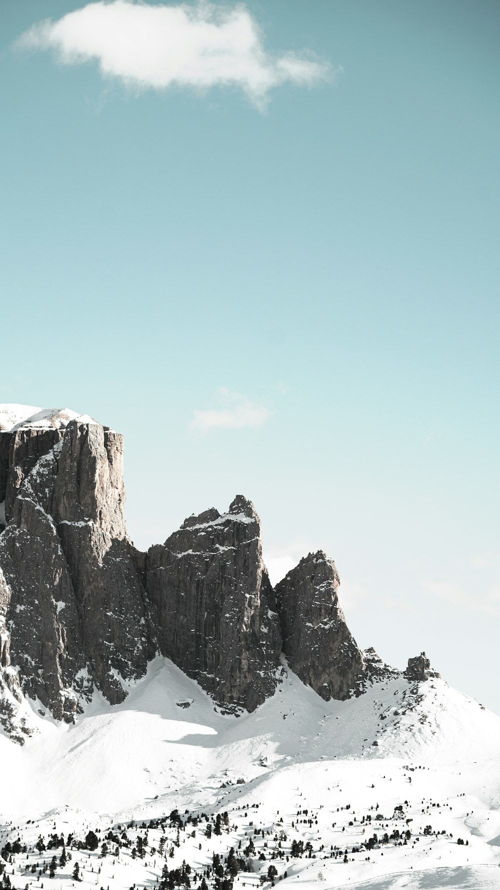 snow covered mountain under blue sky during daytime