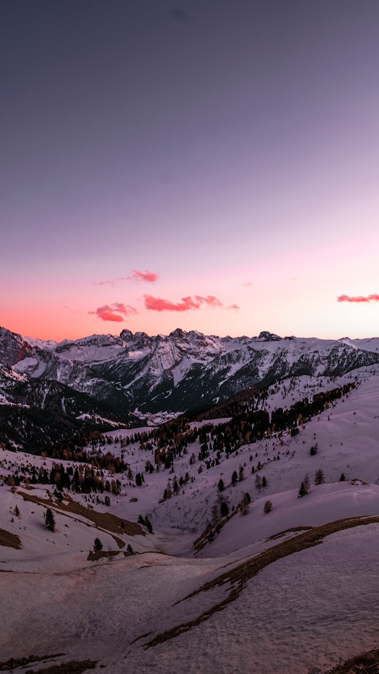 snow covered mountain during sunset in Dolomiti di Sesto Italy
