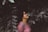 woman in pink scoop neck shirt wearing black sunglasses