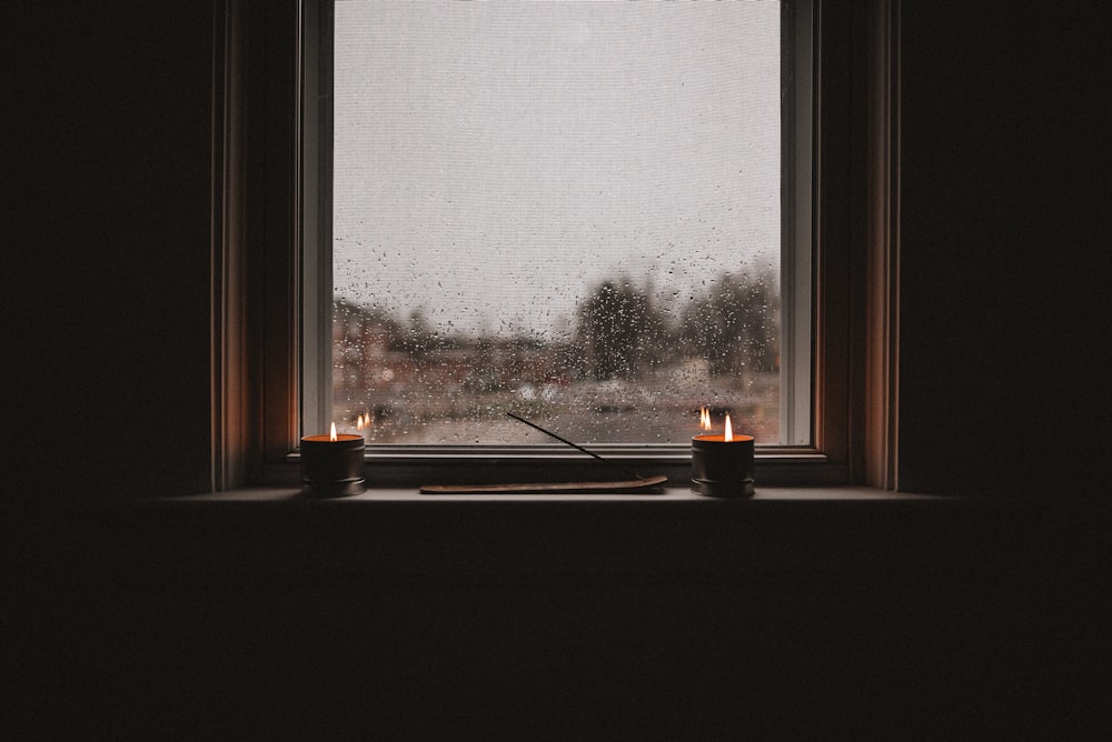 white wooden framed glass window