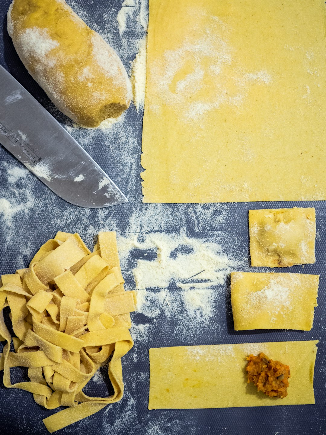 sliced cheese on blue and white table