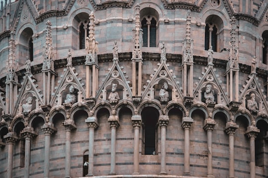 brown and blue concrete building in Piazza dei Miracoli Italy