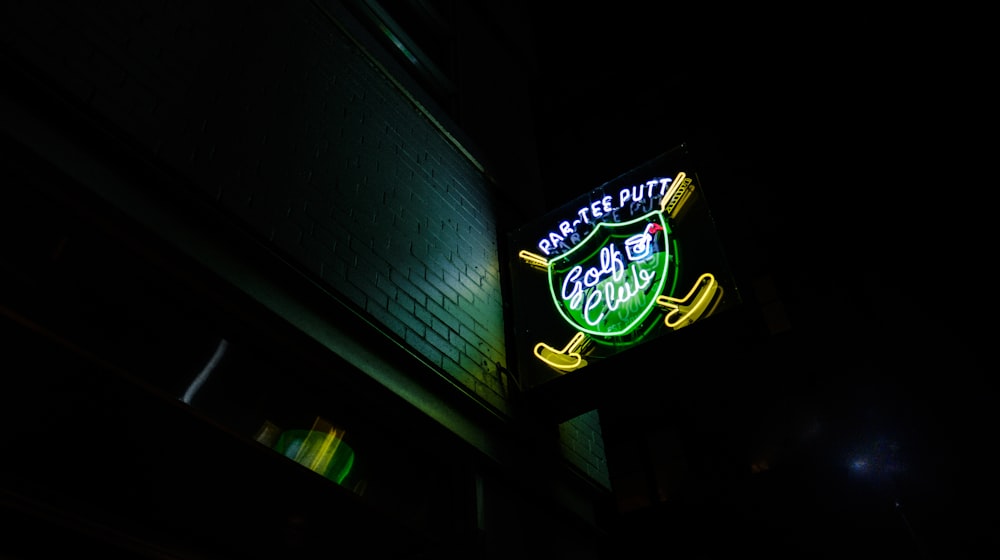 green and yellow neon light signage