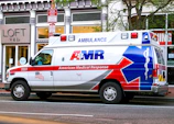 an ambulance parked on the side of the road