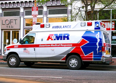 an ambulance parked on the side of the road