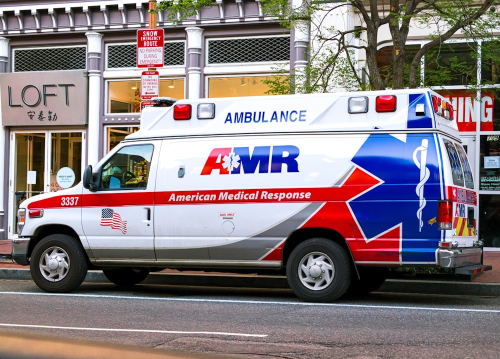 an ambulance parked on the side of the road