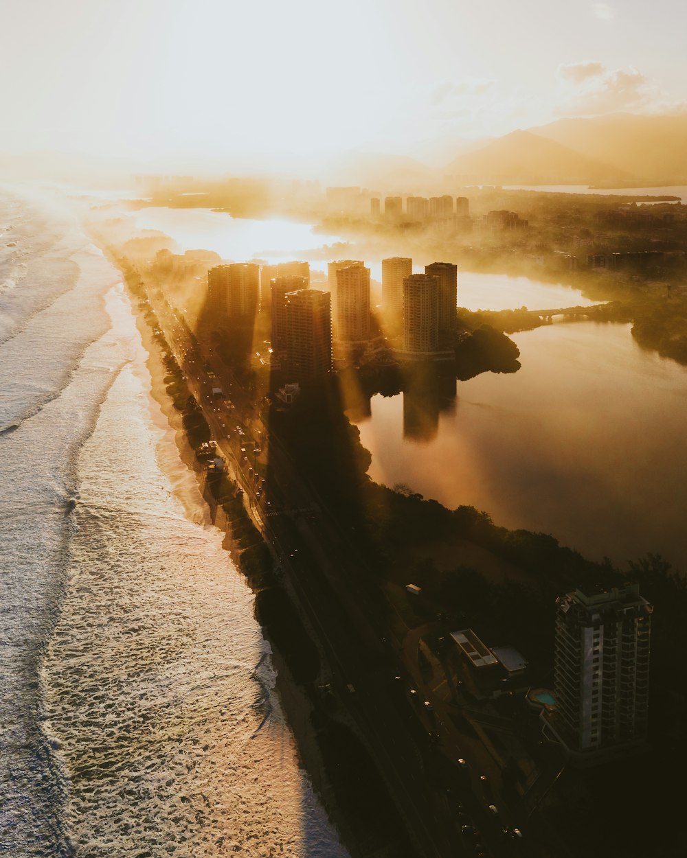 high rise buildings near sea during daytime