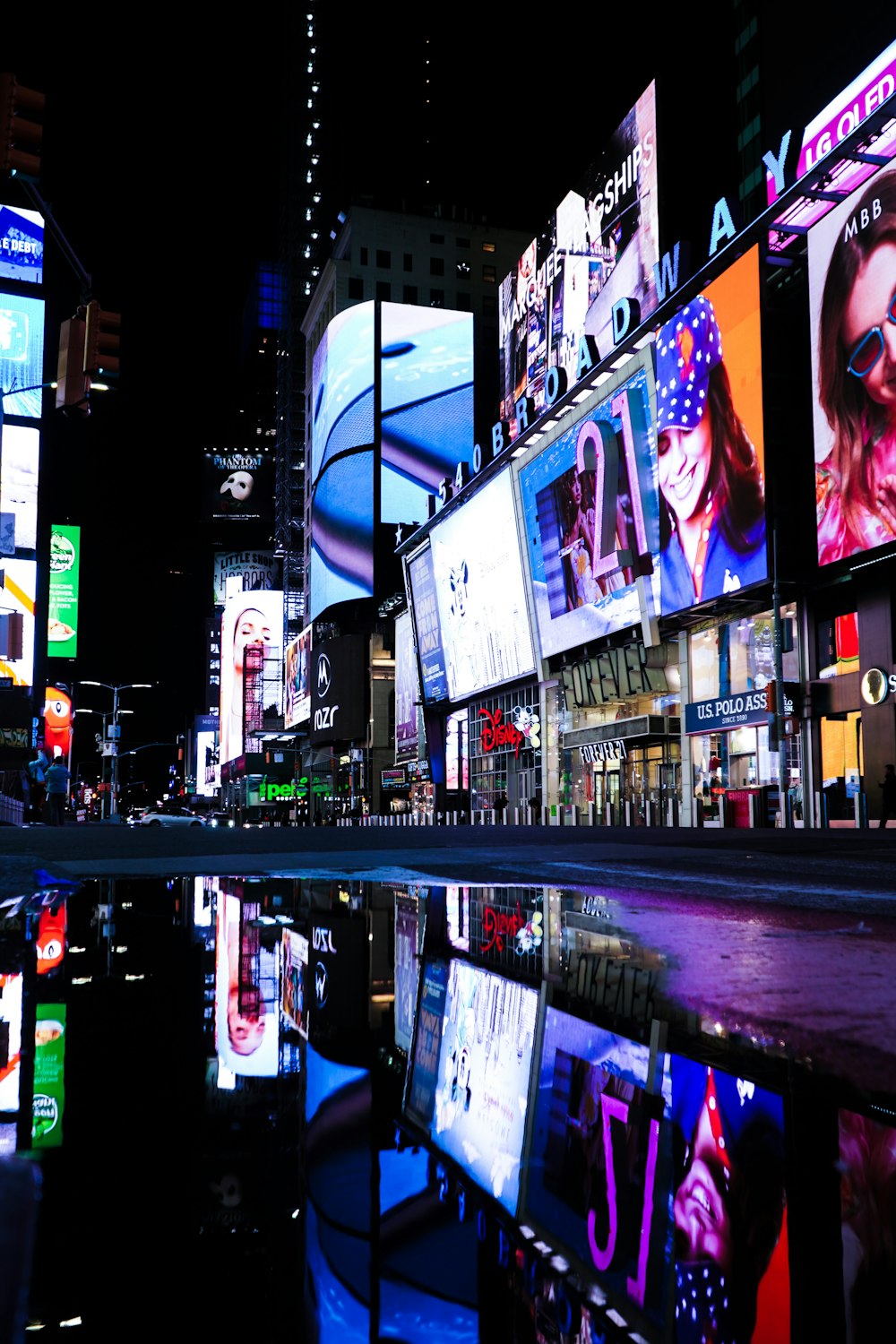 people walking on street during night time