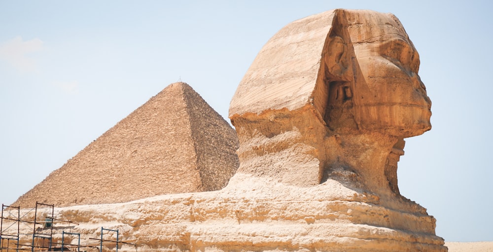 brown rock formation under blue sky during daytime