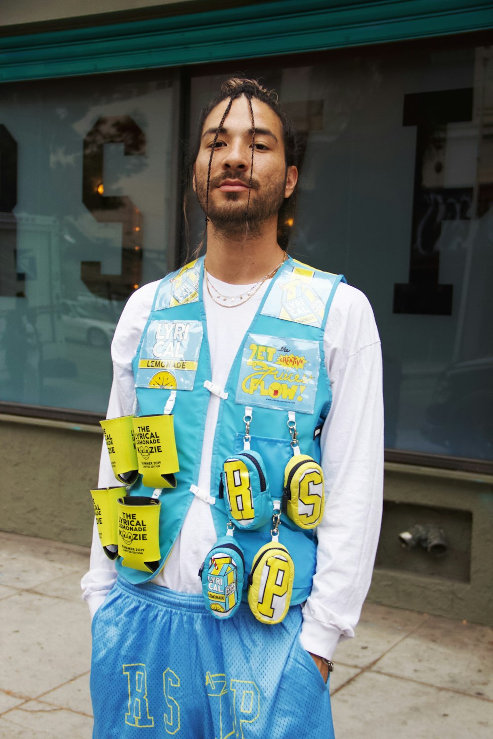 man in white button up shirt wearing yellow and blue jersey shirt