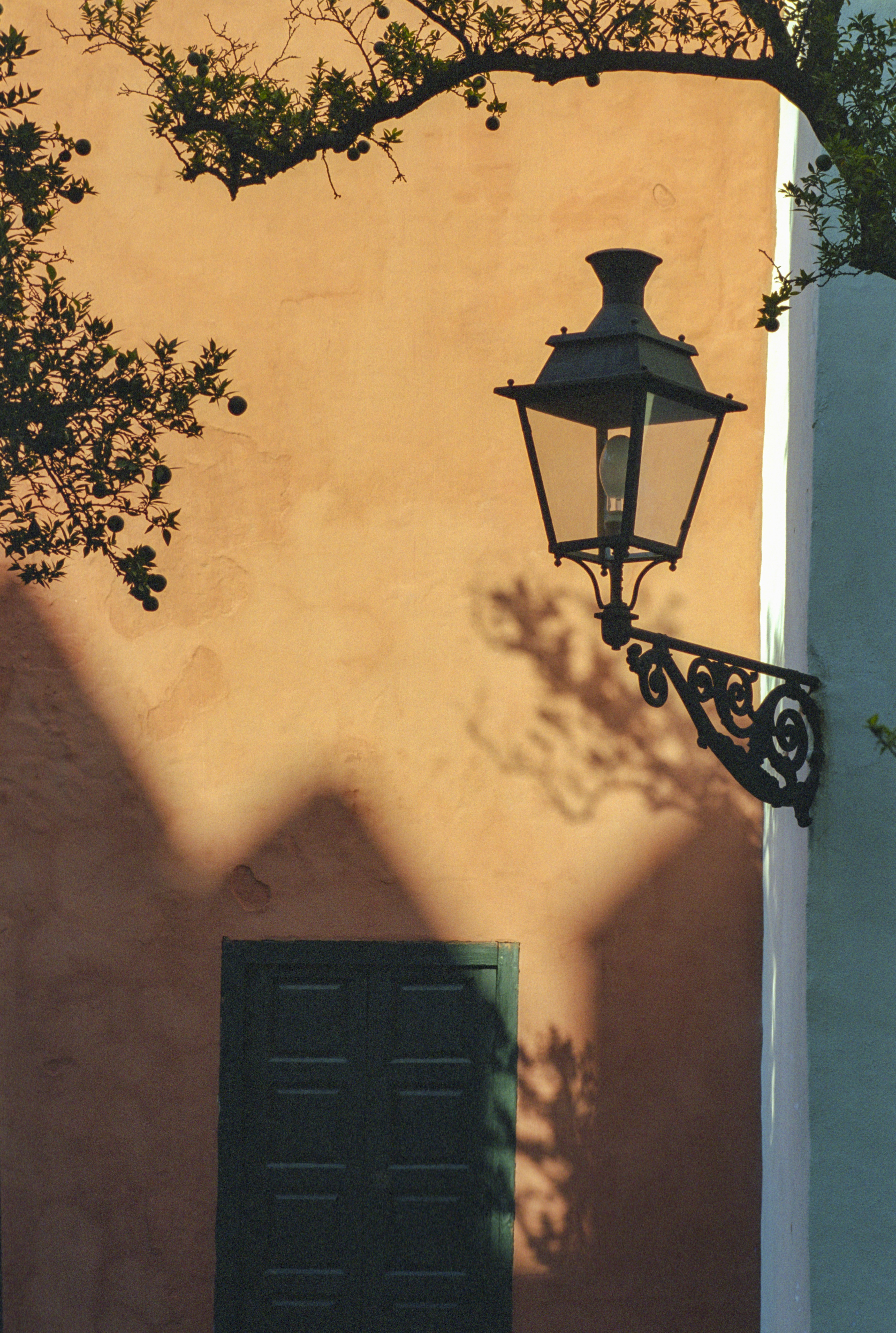 The afternoon shadows on the terracotta walls of the Alcazar gave a nice frame for this old lamp. Love the texture and the film grain in this image. Shot on 35mm film, Canon A2E.