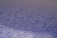 Close-up of a quartz countertop showing its non-porous surface with water droplets beading up.