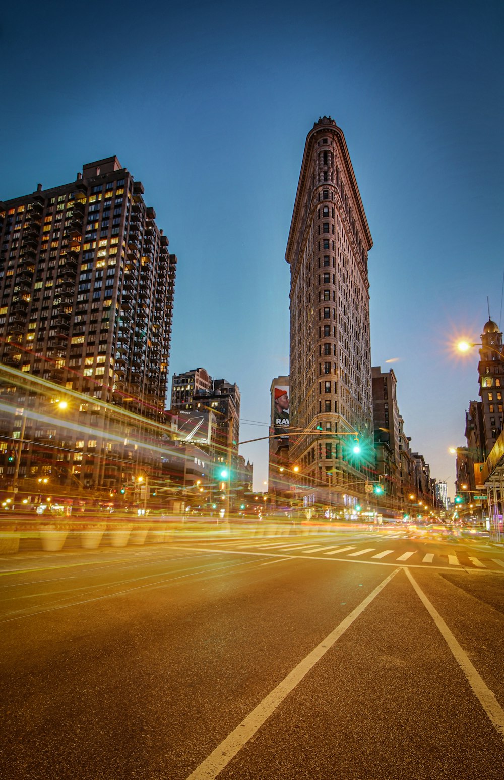 city buildings with lights during night time