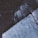 The image depicts a close-up view of a textured concrete surface with chalk markings or writings. There is a prominent crack running through the concrete, adding a sense of ruggedness. The lighting is dim, and the colors are predominantly cool tones, giving it a moody atmosphere.