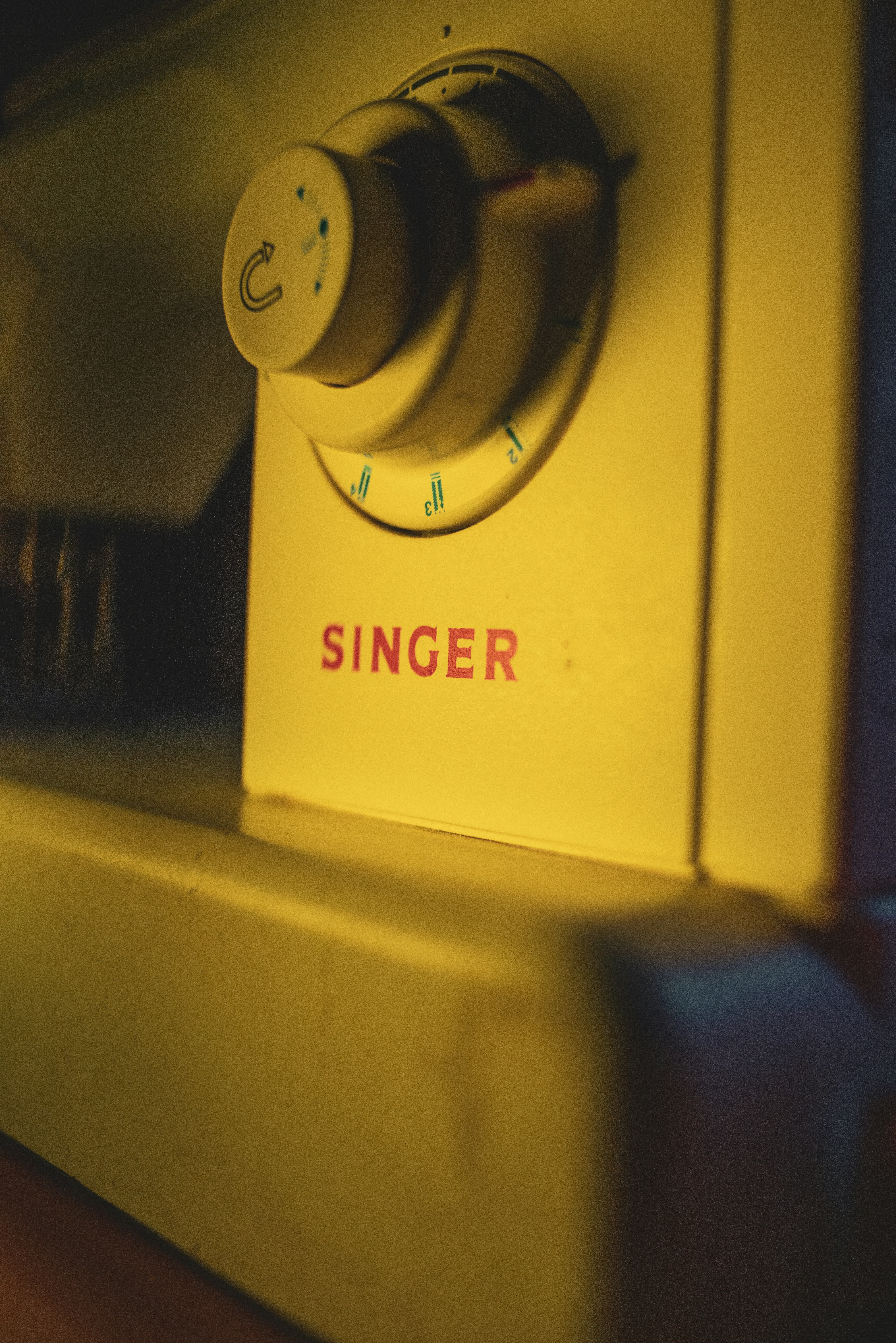 white and yellow washing machine