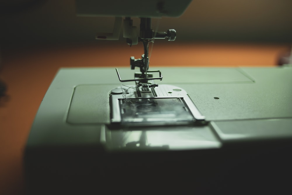 sewing machine in close up photography