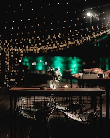 An outdoor setting featuring LED string lights creating a cozy atmosphere.