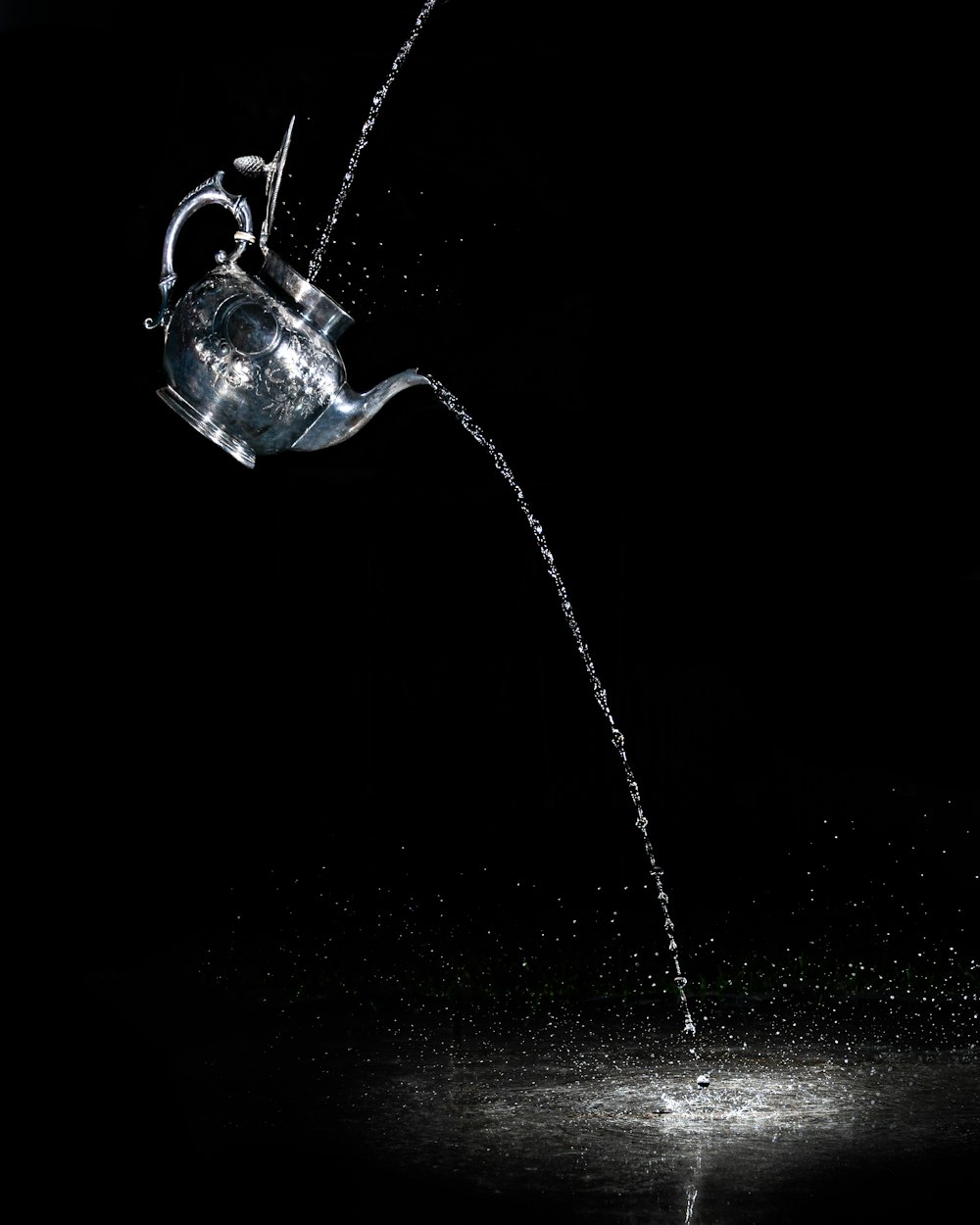 water pouring from clear glass mug