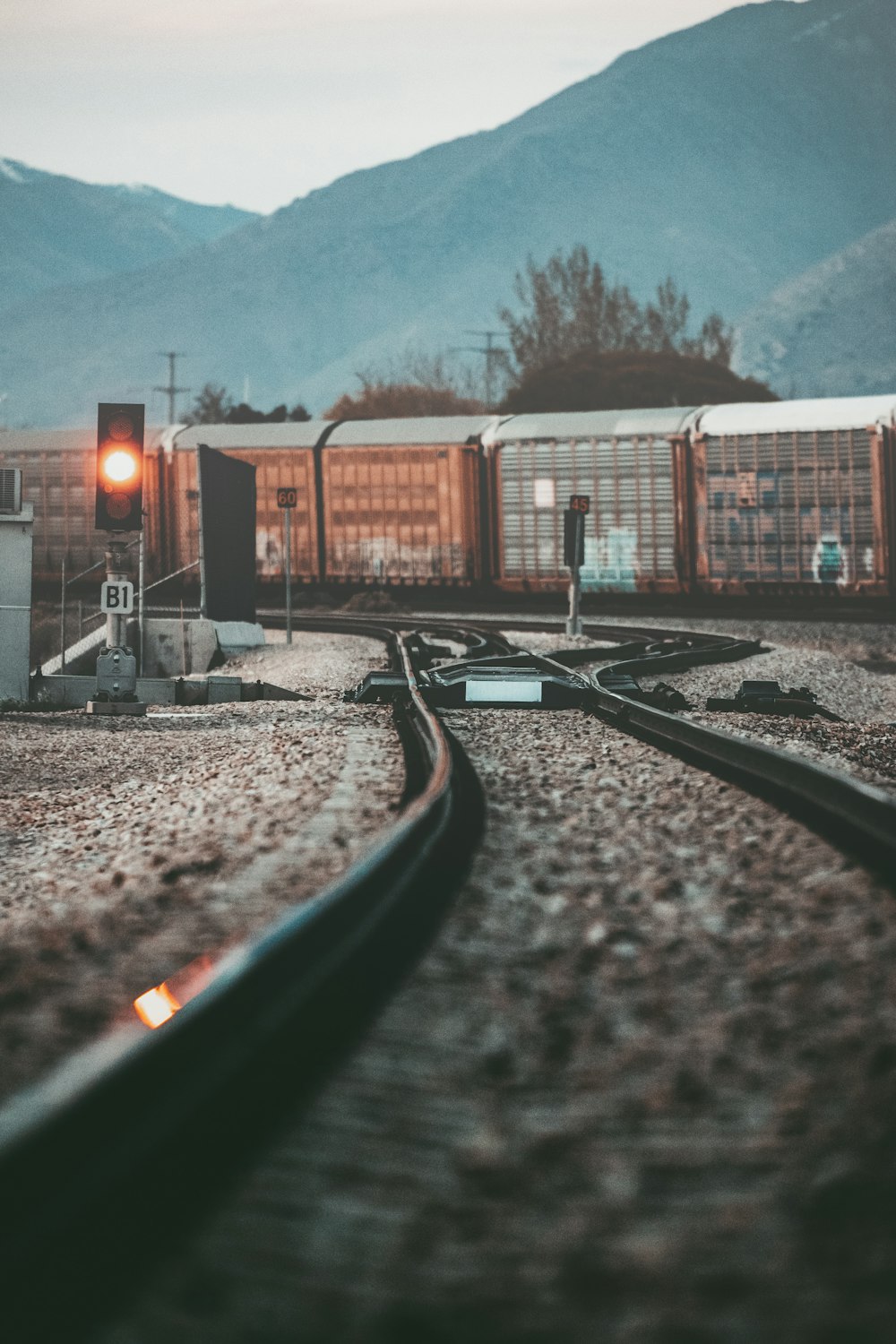 train rail near brown building during daytime