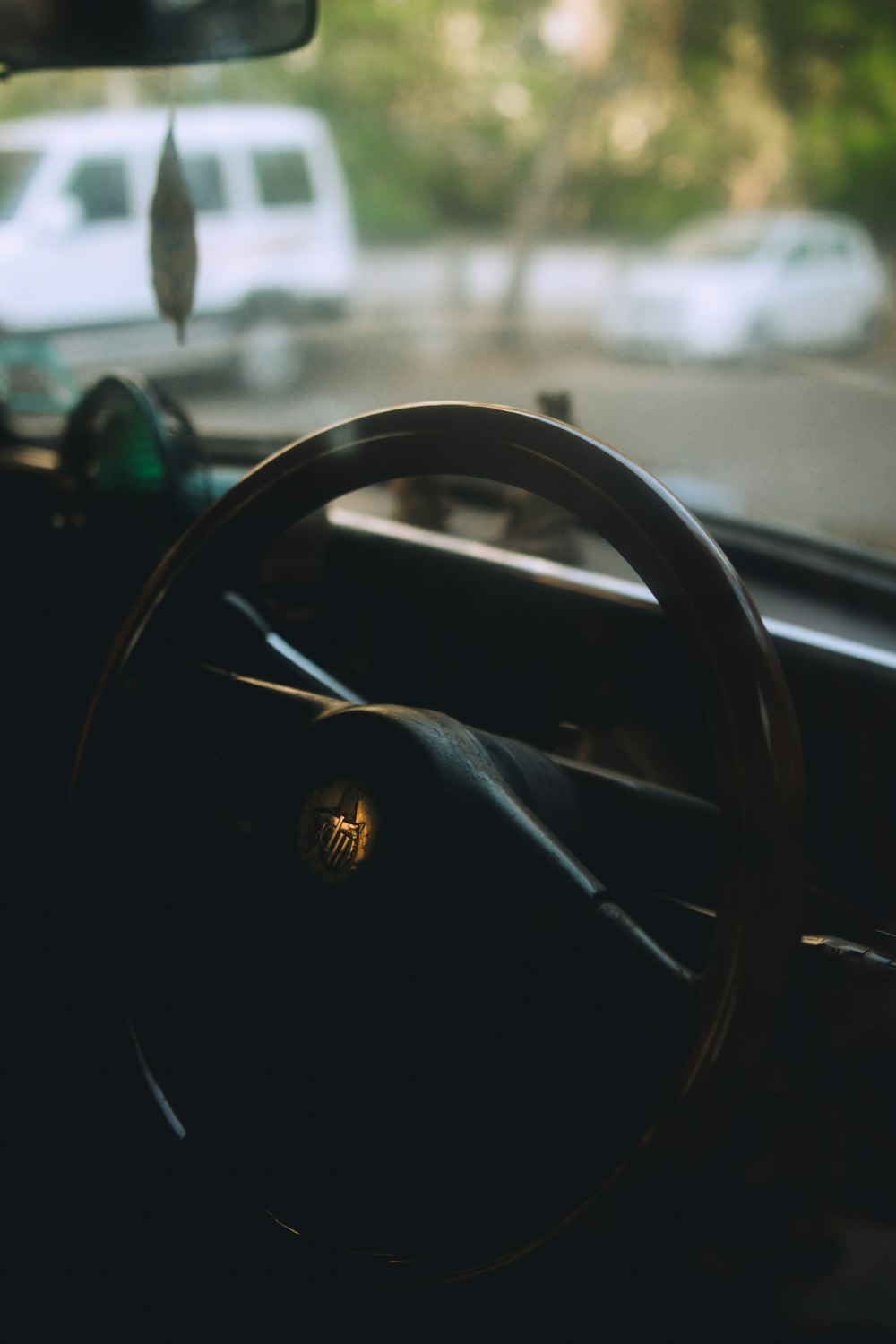 black steering wheel in tilt shift lens