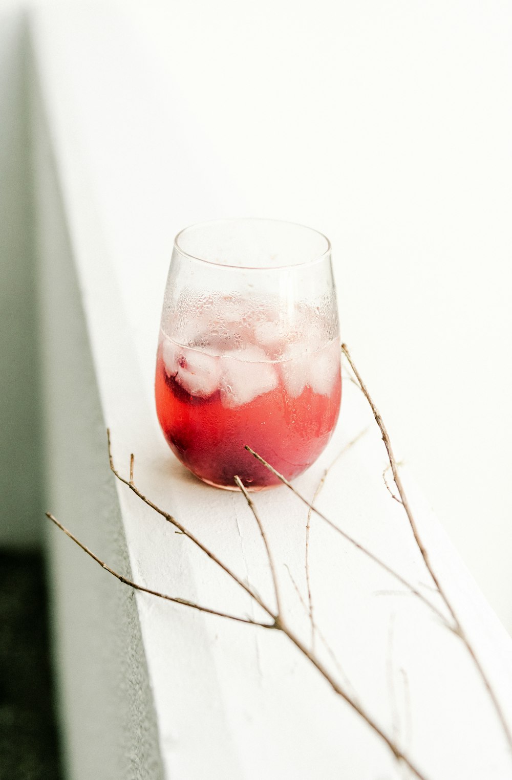 red wine in clear drinking glass