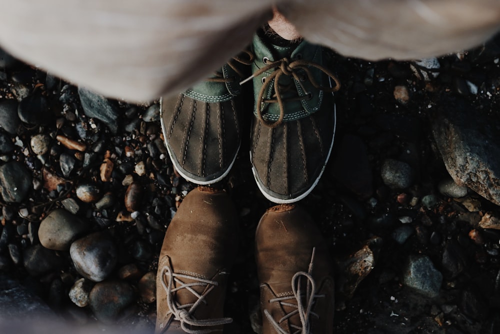 person wearing brown leather shoes