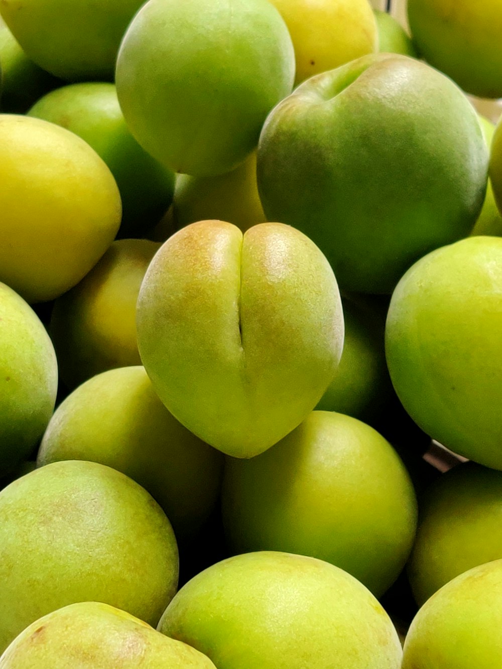 green apples on white ceramic plate