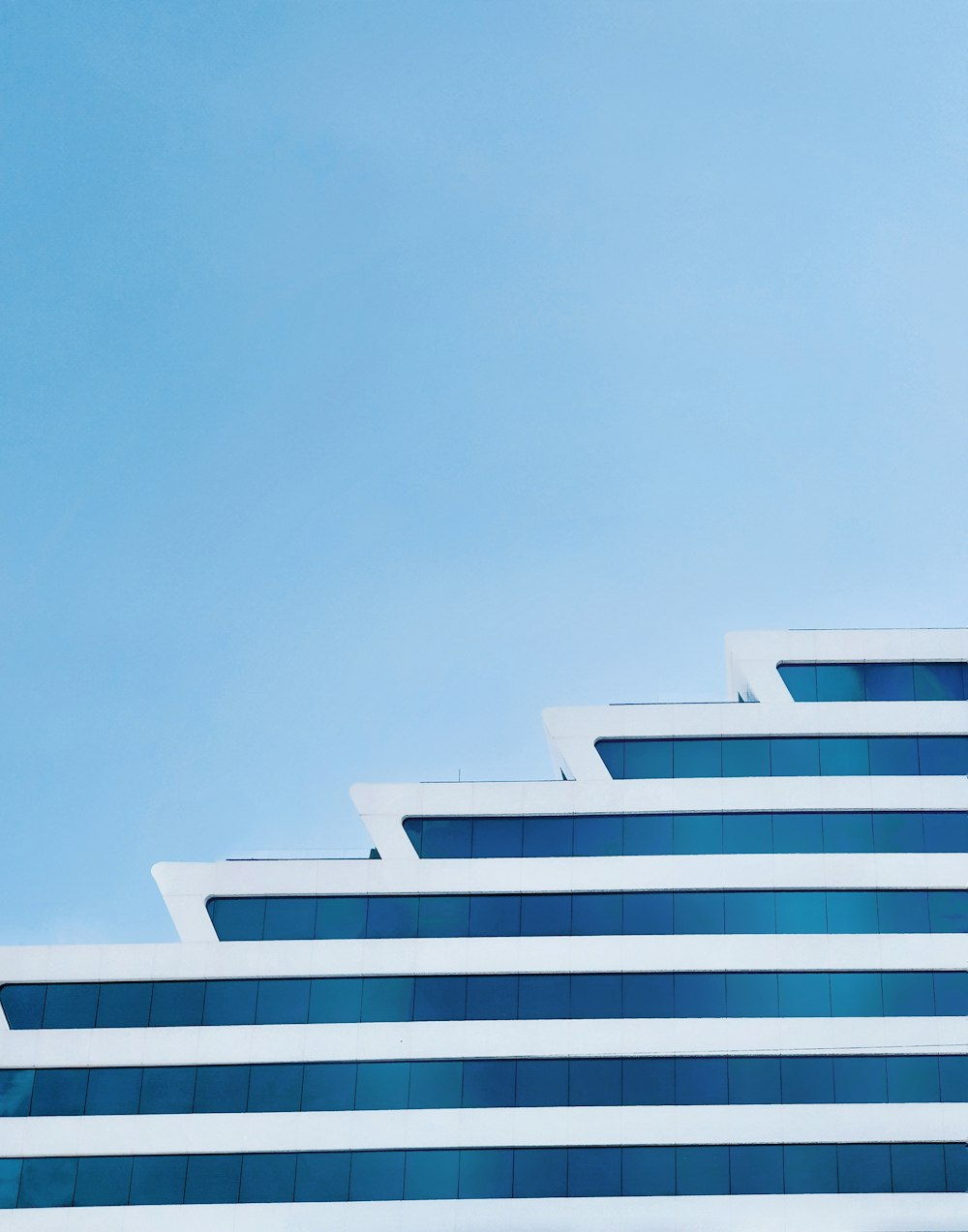 white and teal concrete building