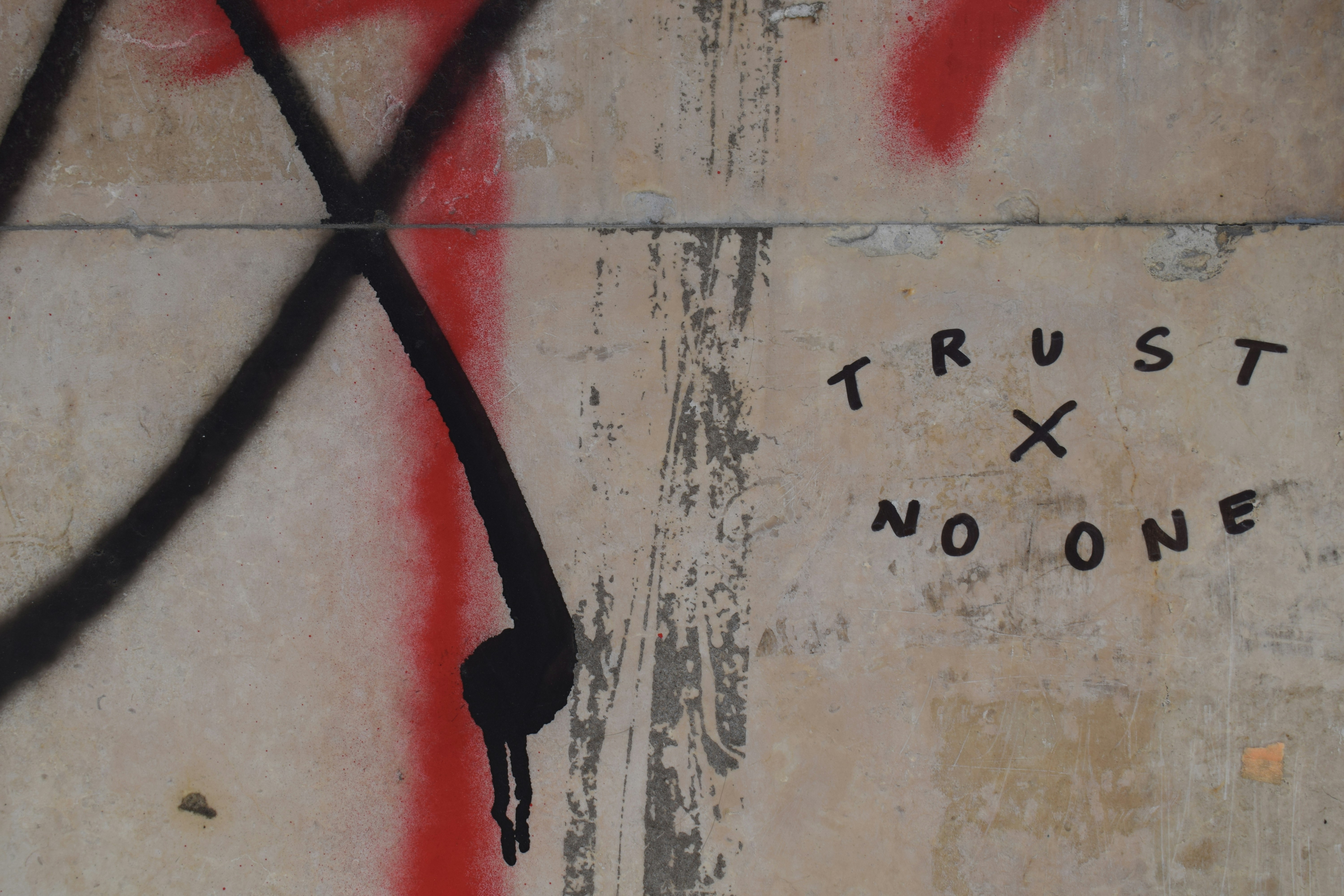 White and red wall with analog clock