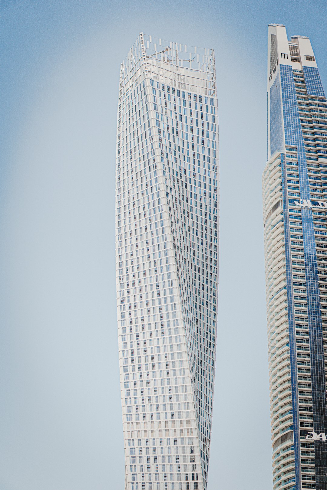 white and blue high rise building