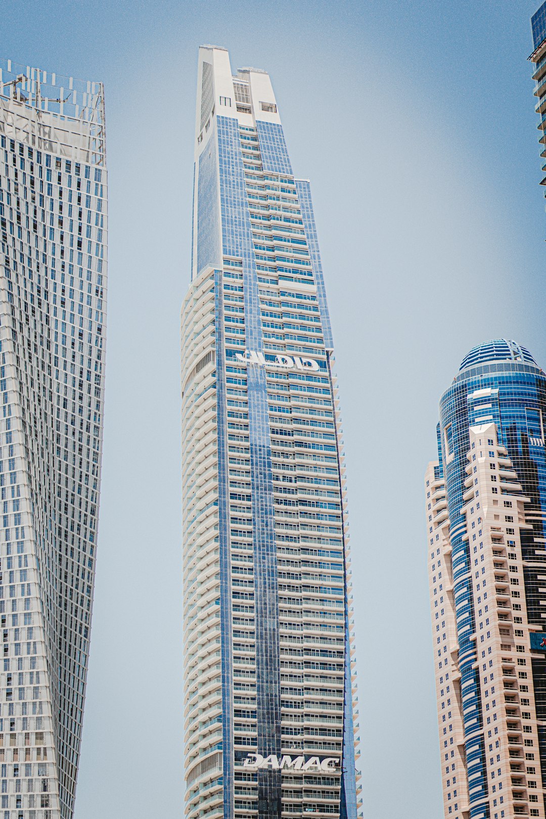 white and blue high rise building