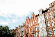 Amsterdam office exterior with European architectural details on a clear day.