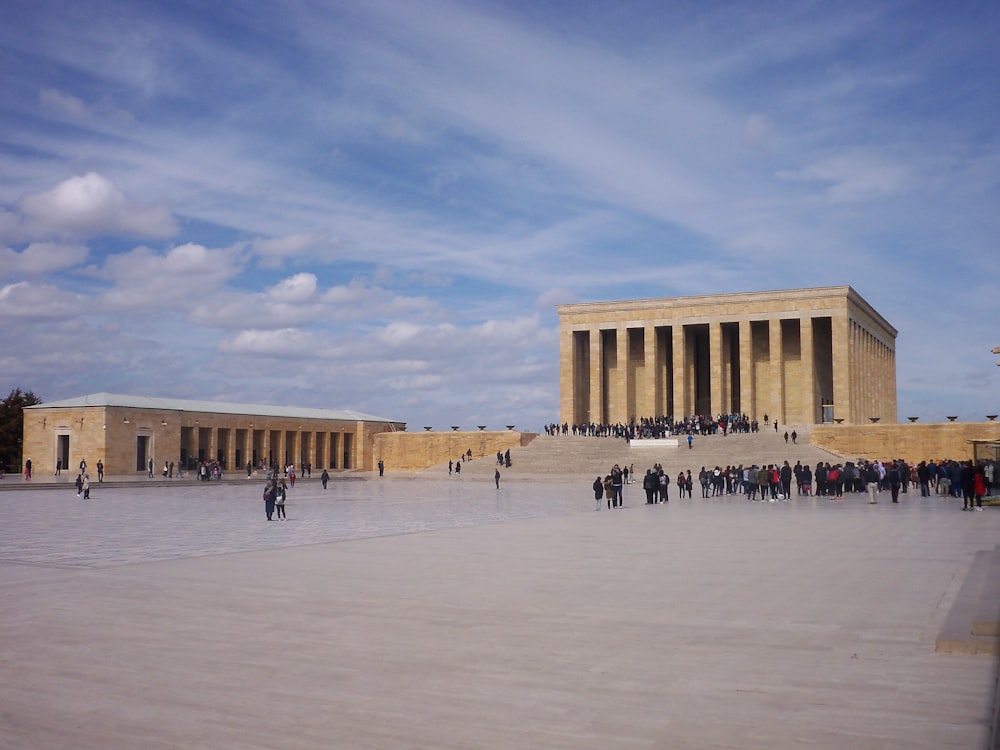 people walking on snow covered field during daytime