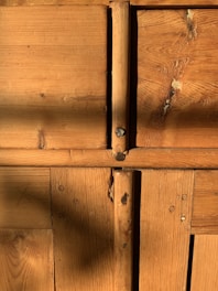 Natural wood panels highlighting smooth craftsmanship and warm tones.