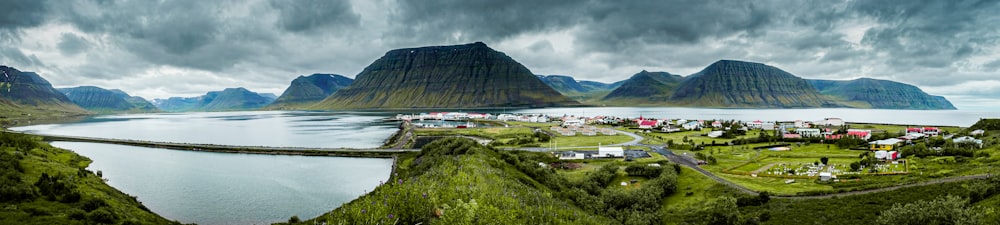 green mountain under white clouds during daytime