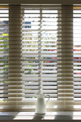 white window blinds during daytime