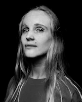 An artistic black-and-white portrait used in a branding campaign.