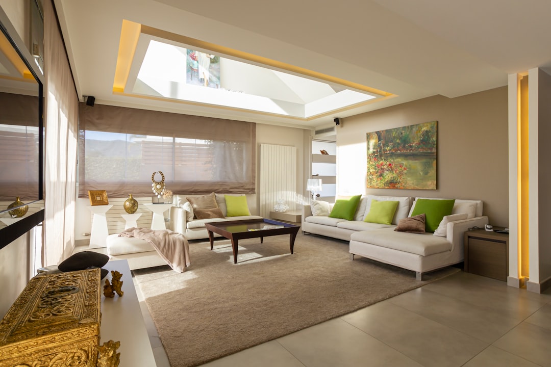 living room with white sofa and brown wooden coffee table