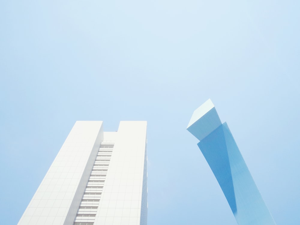 white concrete building under blue sky during daytime