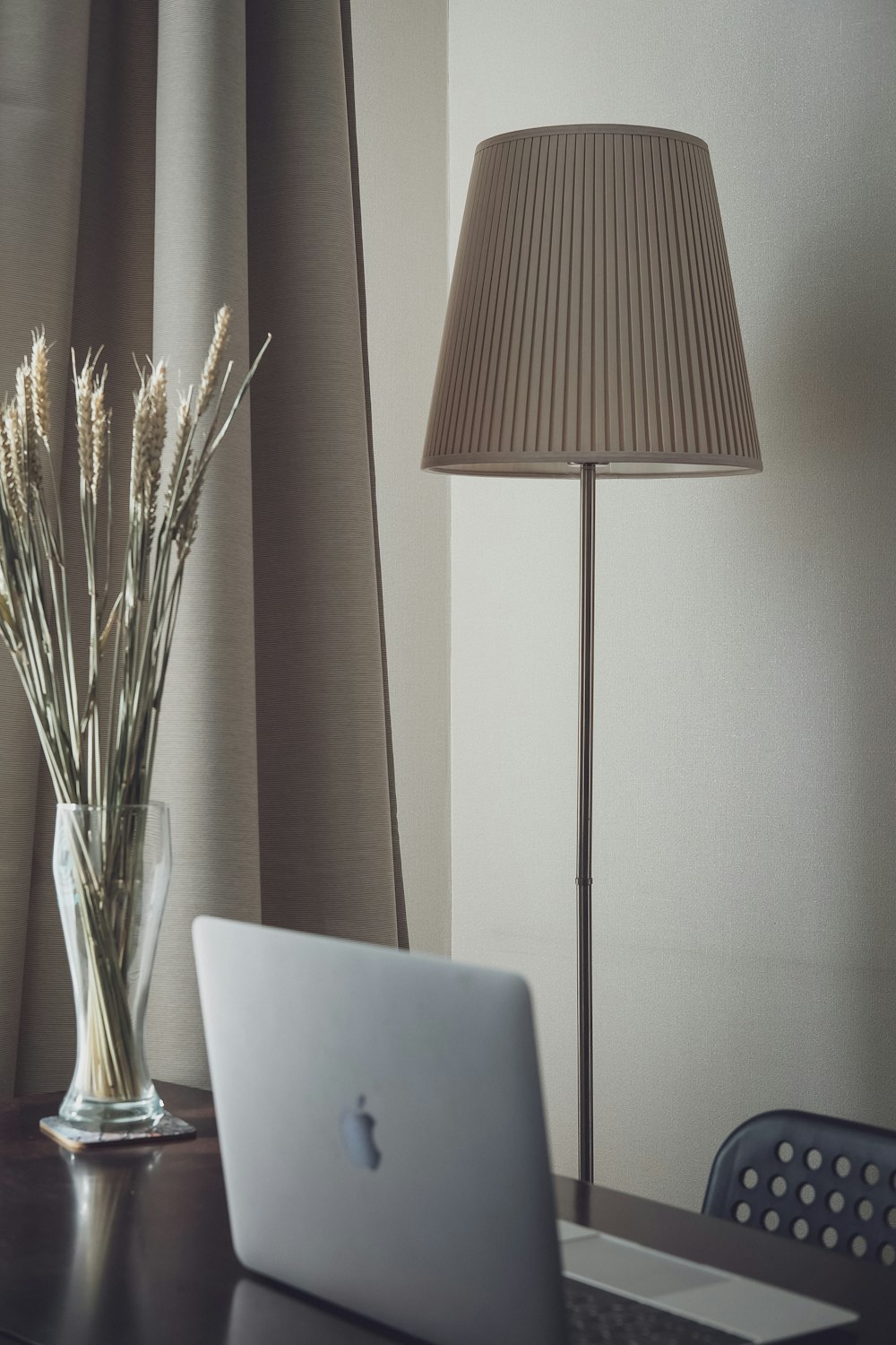 white and brown floor lamp