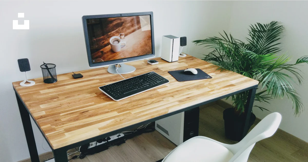 Macbook pro on brown wooden table photo – Free Montroy Image on Unsplash