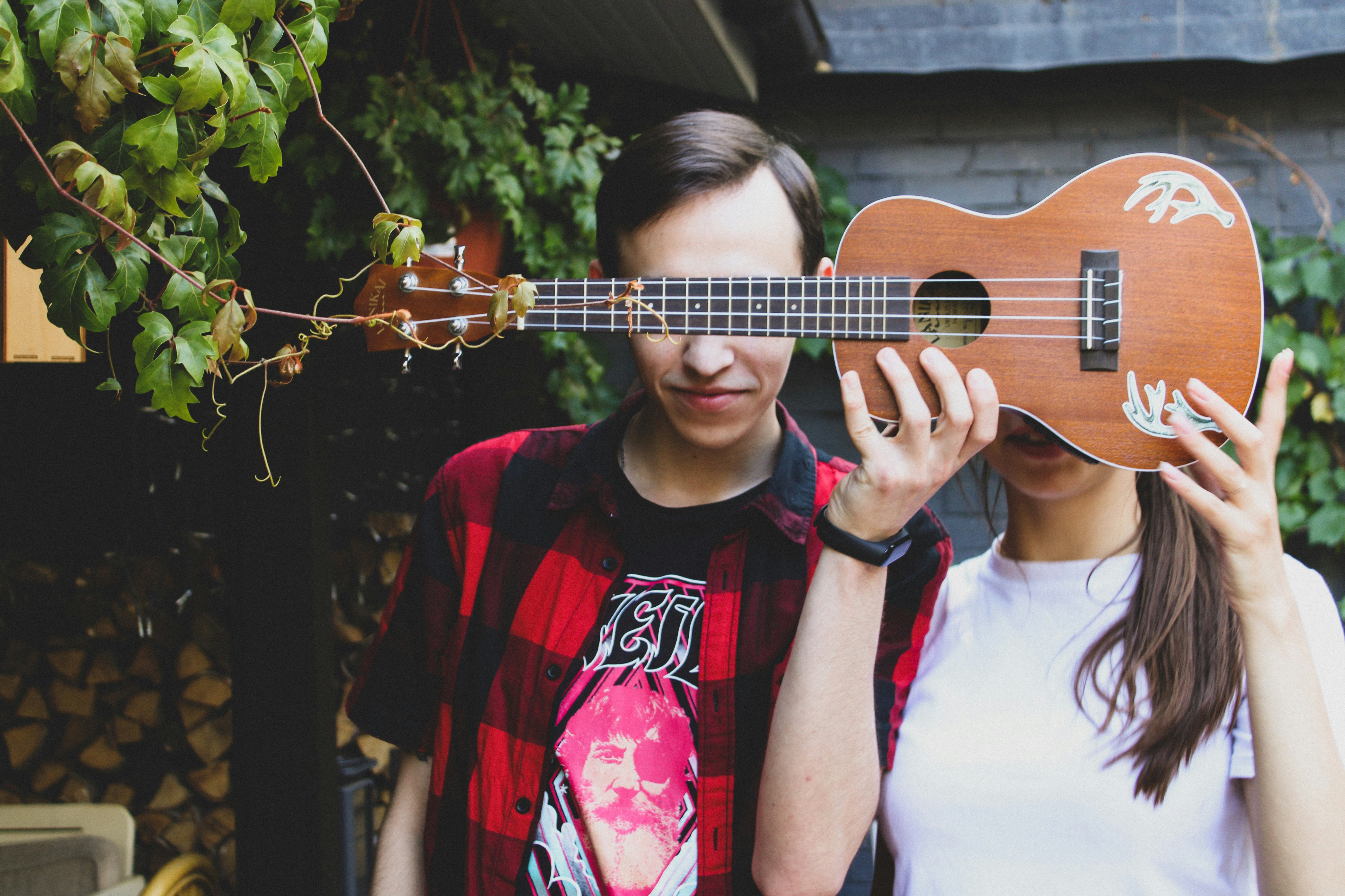 Guy and girl with ukulele