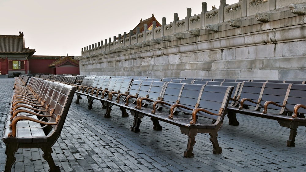 blue and brown wooden bench on gray concrete floor