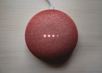 A b1 node hardware device glowing softly in a modern home setup.