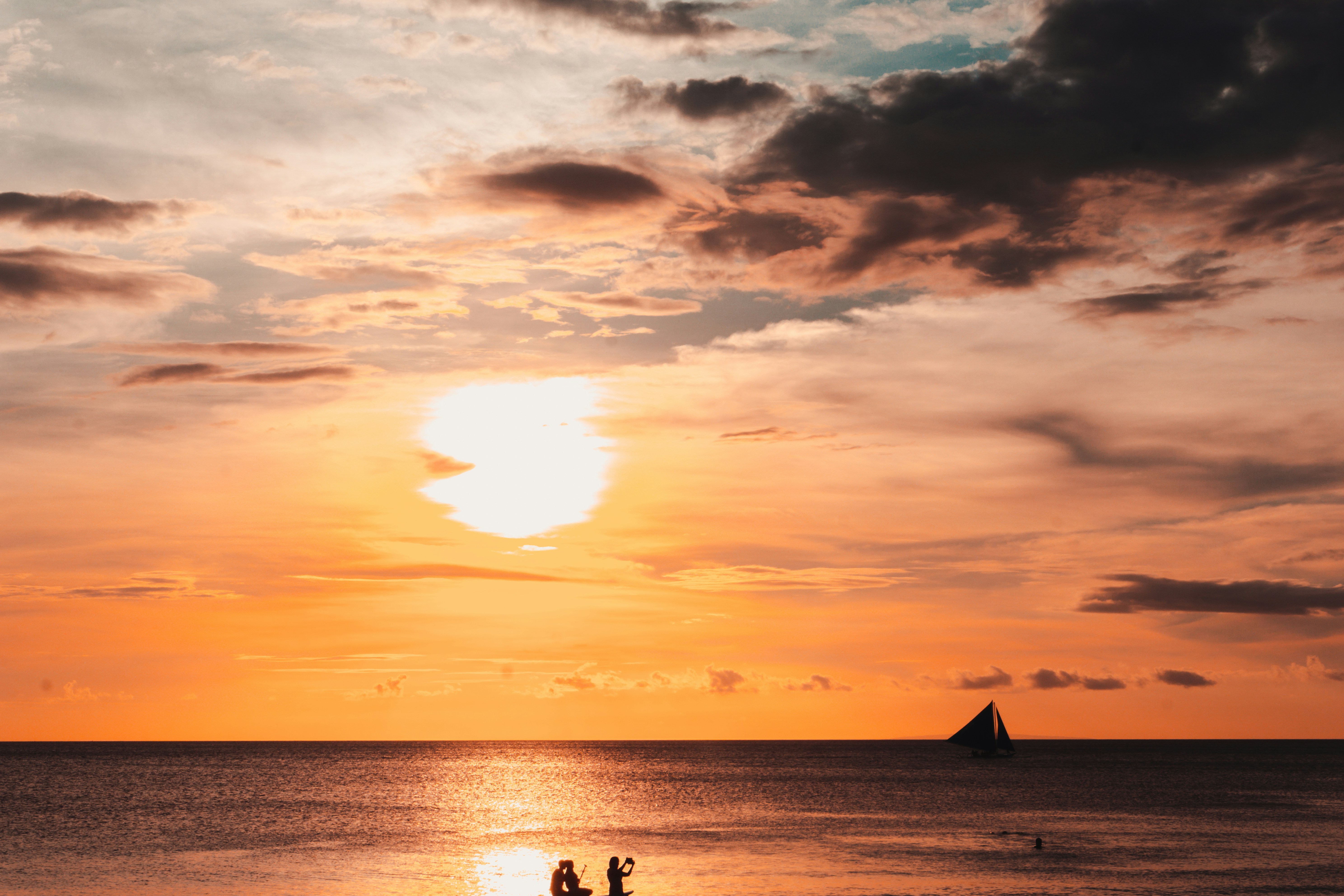 people on beach during sunset, 